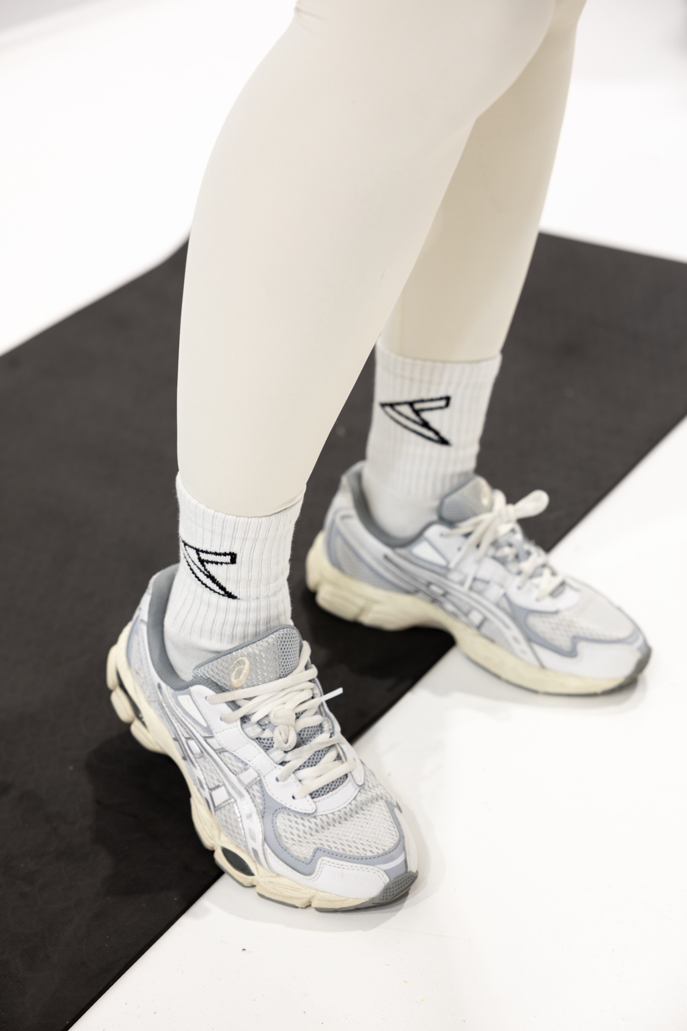 Close-up of Curvletics socks and activewear styling